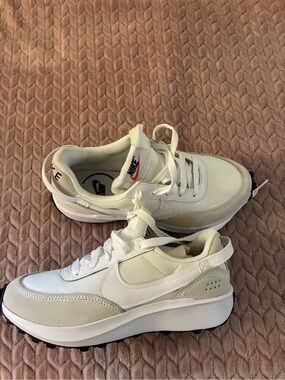 Nike Waffle Debut sneakers in a white and grey colorway,